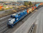 CN 4908/4716/4785 lead a string of double stacks through the Brampton Intermodal Yard. Notice the hand painted signage on the lead CN unit.